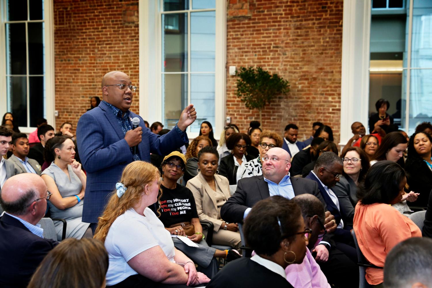 Audience member asking question at Human Level/Brookings conference