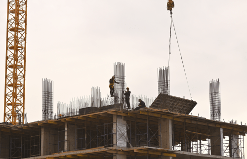 Construction workers on the job representing labor force